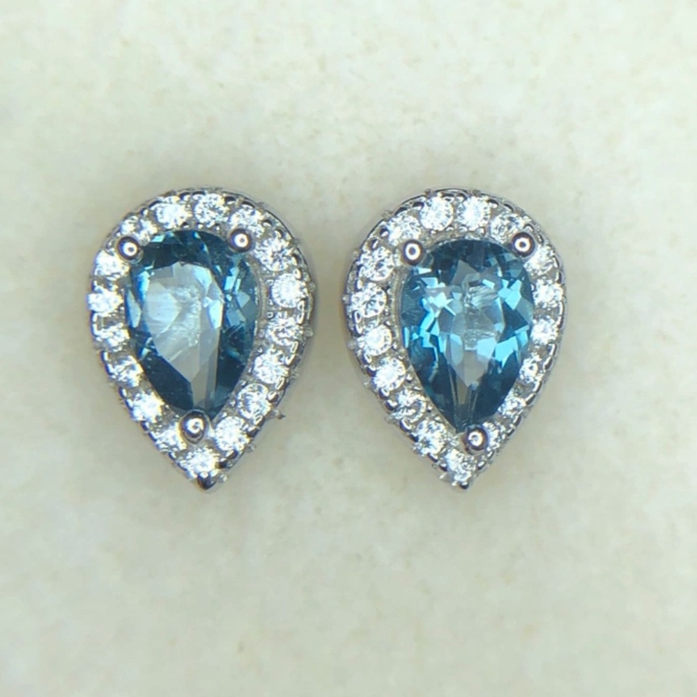 11.34 CTW Swiss Blue Topaz • Rhodium Plated 925 Silver - Picture 5 of 7